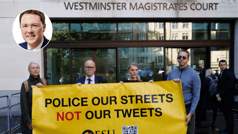 Toby Young protests