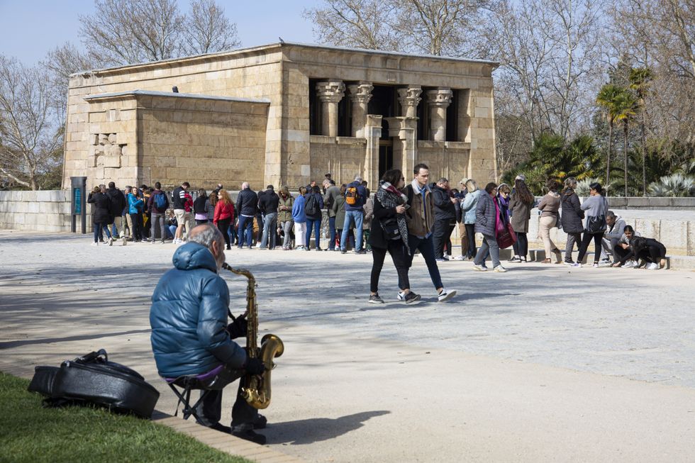 Tourists queuing in Madrid to enter the Temple of Debod