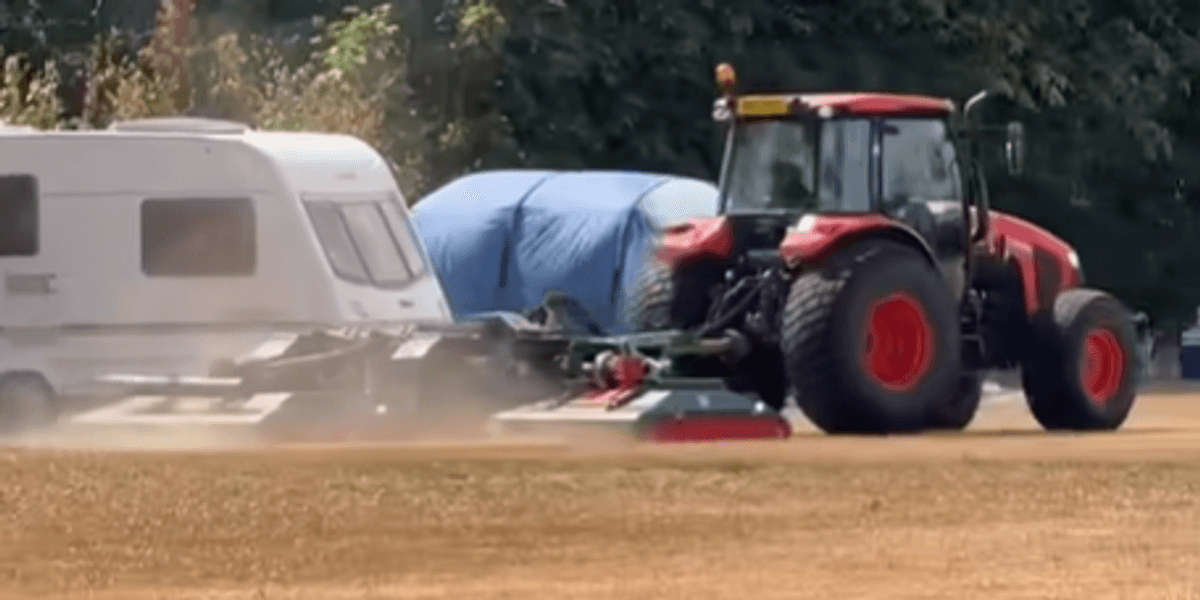 Furious farmer uses tractor to help clear off travellers after caravans pitch up outside primary school