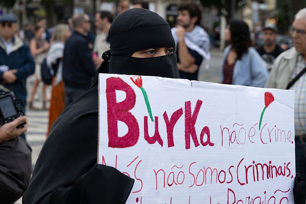 \u200bA female protester