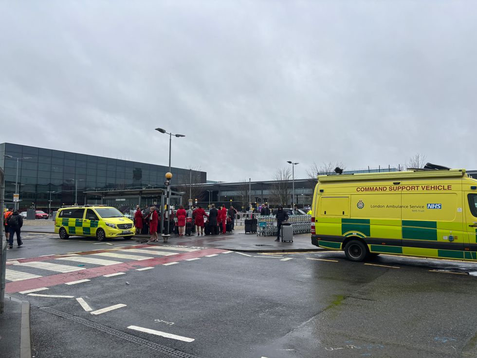 \u200bAn emergency vehicle outside Heathrow Terminal 3 after a man has been arrested on suspicion of assaul