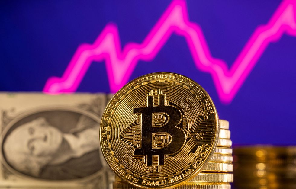 \u200bBitcoin and a chart in the background