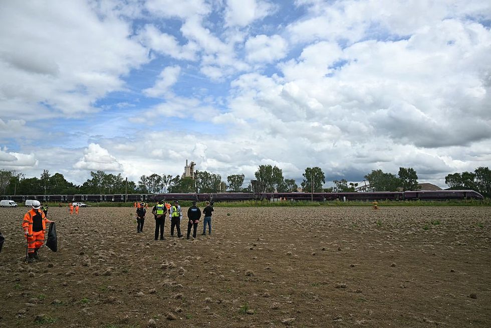 \u200bBritish Transport Police officers, Rail Accident Investigation Branch officers, and Network Rail work at the site