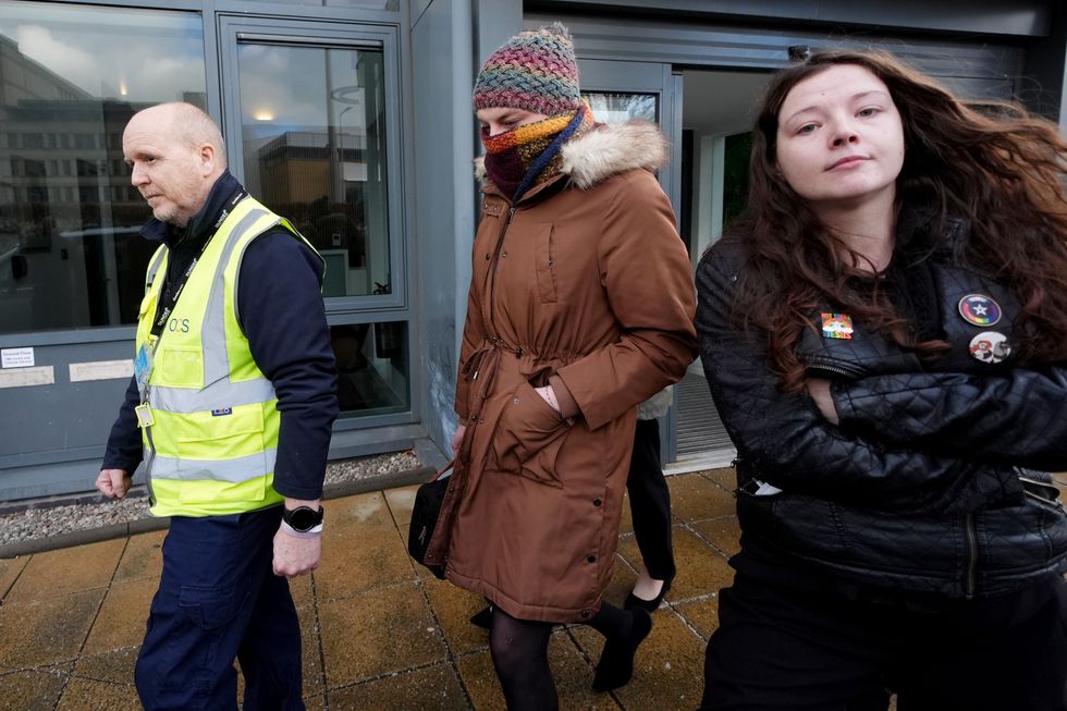 \u200bDr Beth Upton (centre) leaves an employment tribunal in Dundee