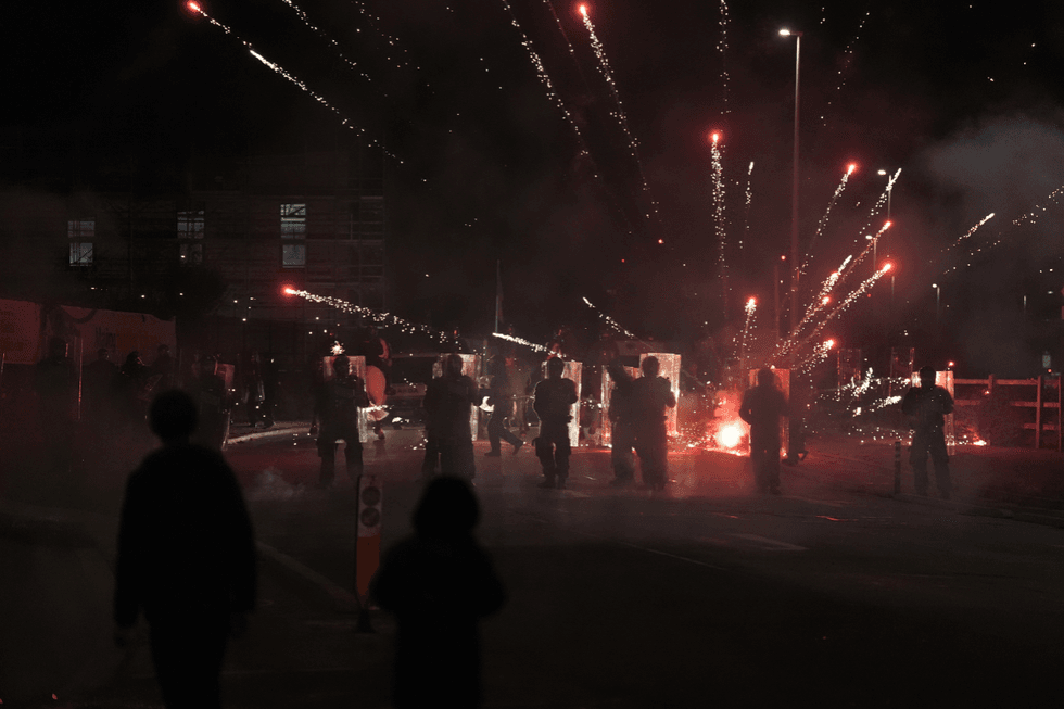 \u200bFireworks were thrown at police