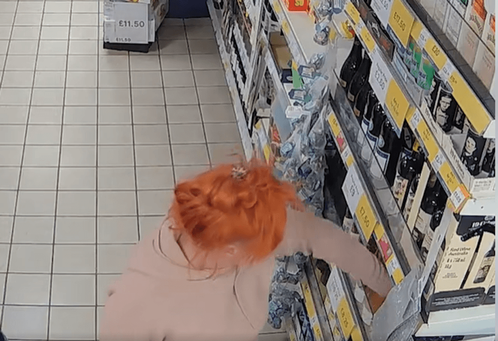 \u200bFootage shows Dodsworth picking up the prosecco