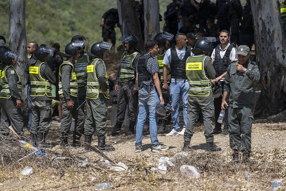 \u200bHundreds of migrants have been prevented from breaching the border into Spain's North African exclave of Ceuta