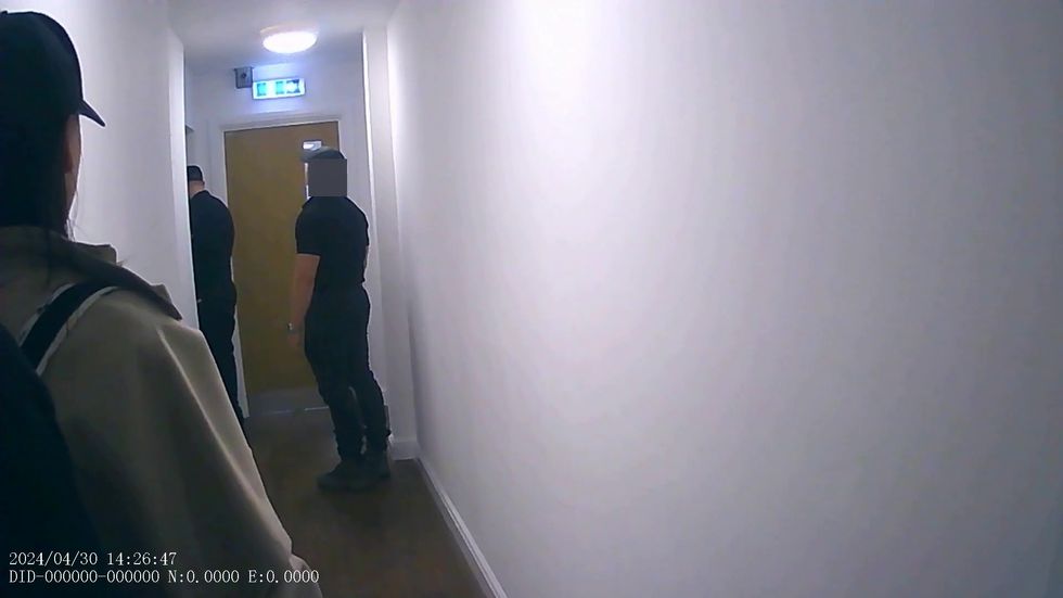 \u200bMatthew Trickett (centre) knocking on the door of Monica Kwong in an attempt to lure her out of her flat in Pontefract