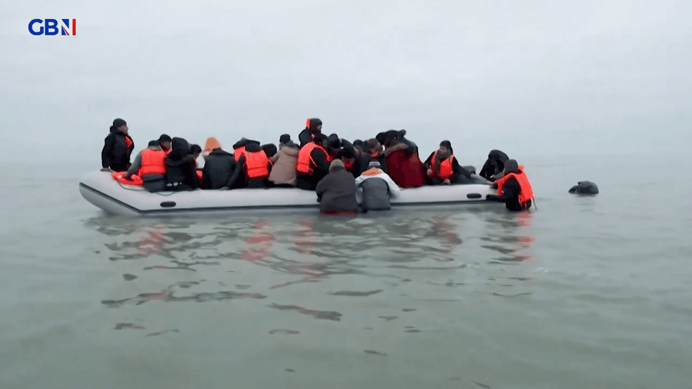 \u200bMigrants aboard a small boat (Stock)