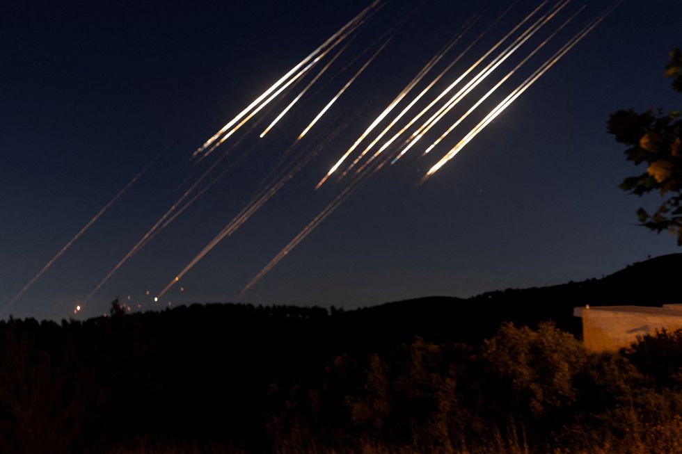 \u200bMissiles can be seen raining down in the sky