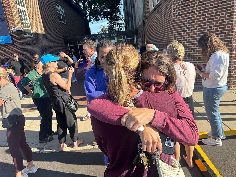 \u200bParents await news of their children's status after shooting at Annunciation Church