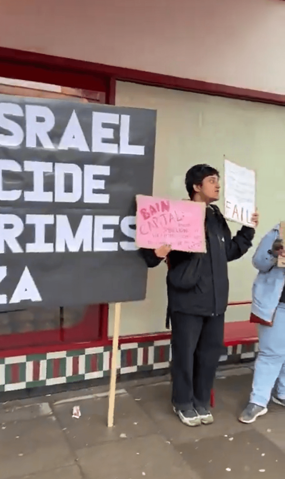\u200bPro-Palestine protesters outside Gails bakery in London