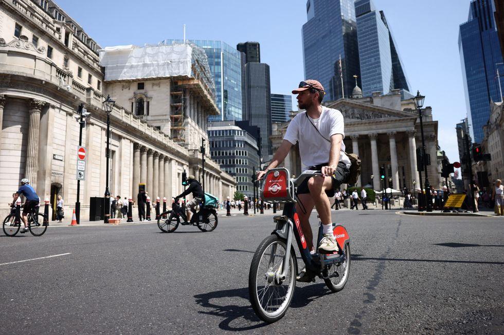 \u200britain experiences record temperatures disrupting schools and transport networks in London,