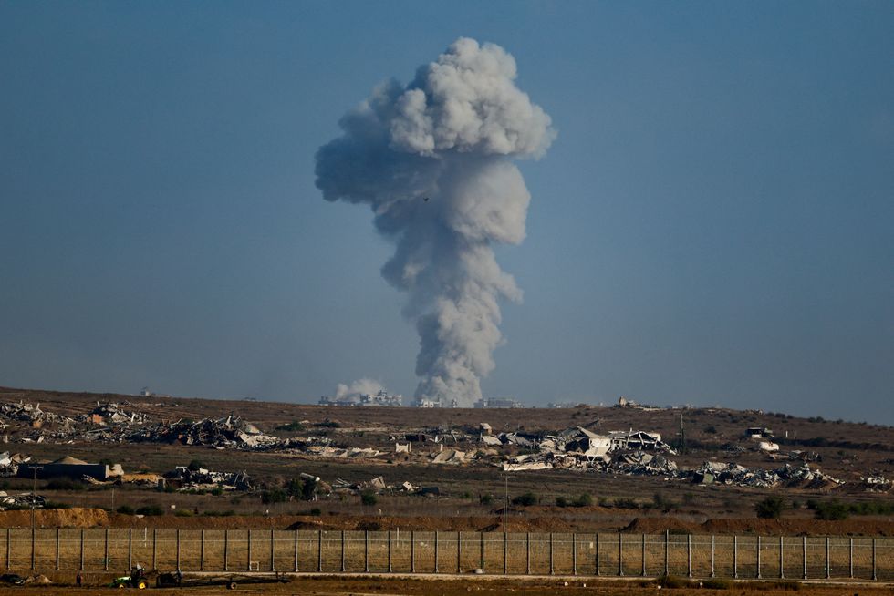 \u200bSmoke rises from Gaza after an explosion, as seen from Israel