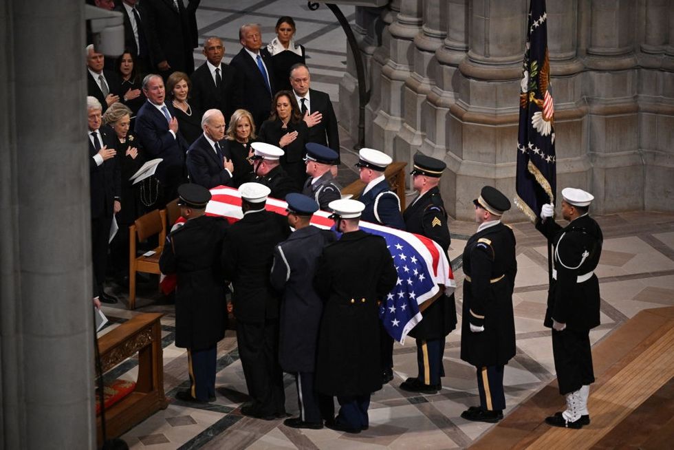 \u200bThe remains of former US President Jimmy Carter are carried out of Washington