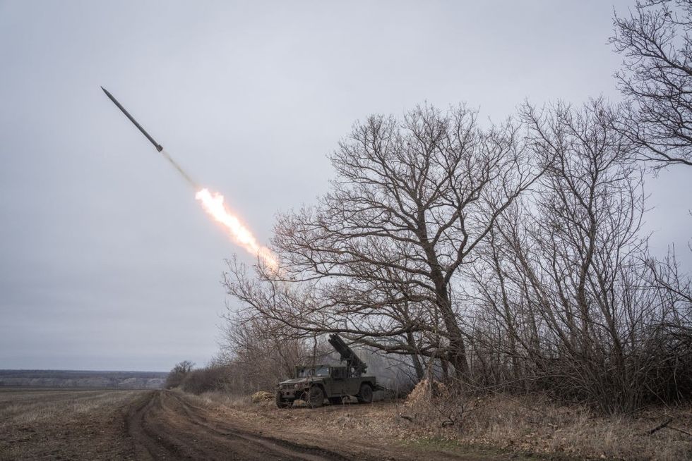 \u200bUkrainian soldiers of 111th brigade operate an American Humvee fitted with Soviet era Grad launcher