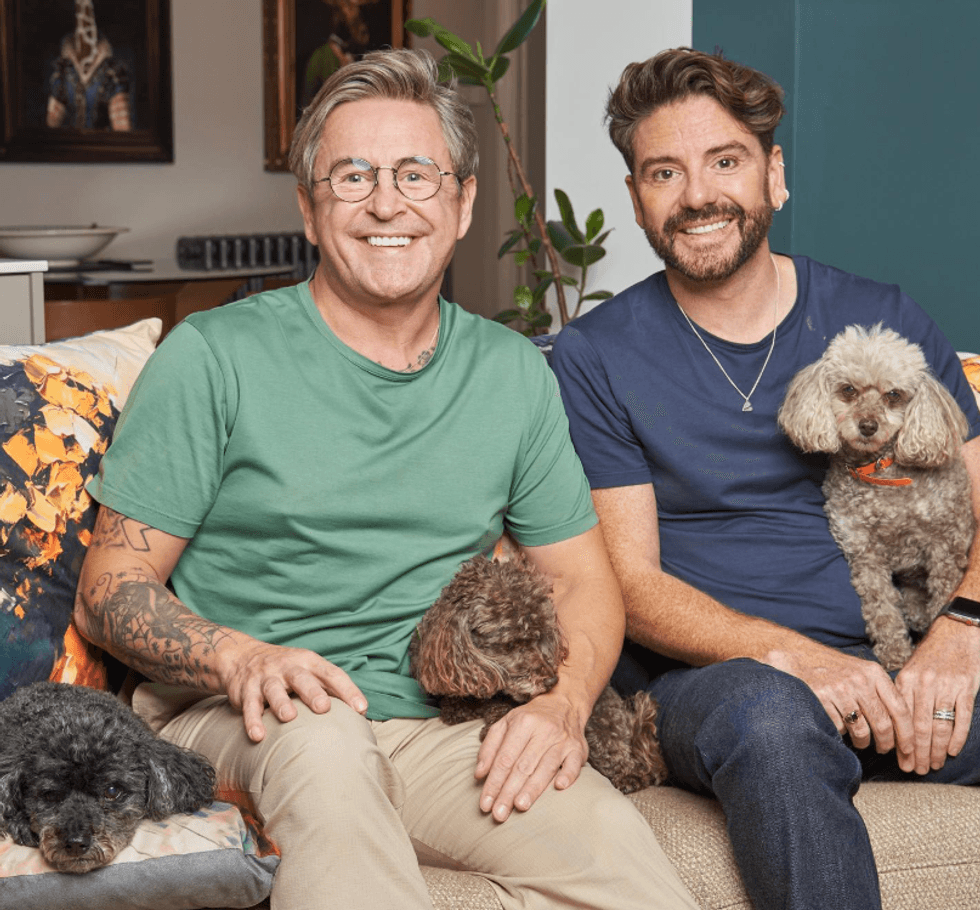 \u200bWebb and Lustig-Webb with their dogs