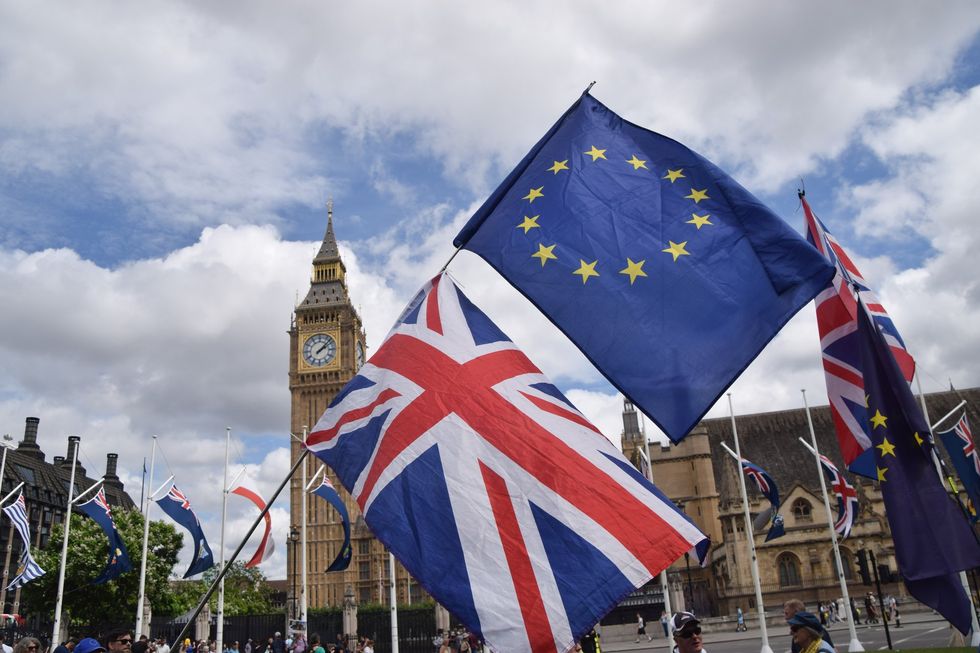 Union Jack and EU flag before Big Ben