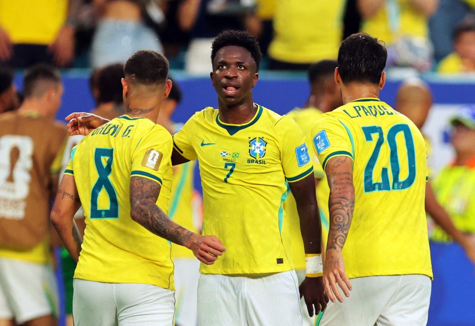Vinicius Jr scored twice after errors at the back from Scotland