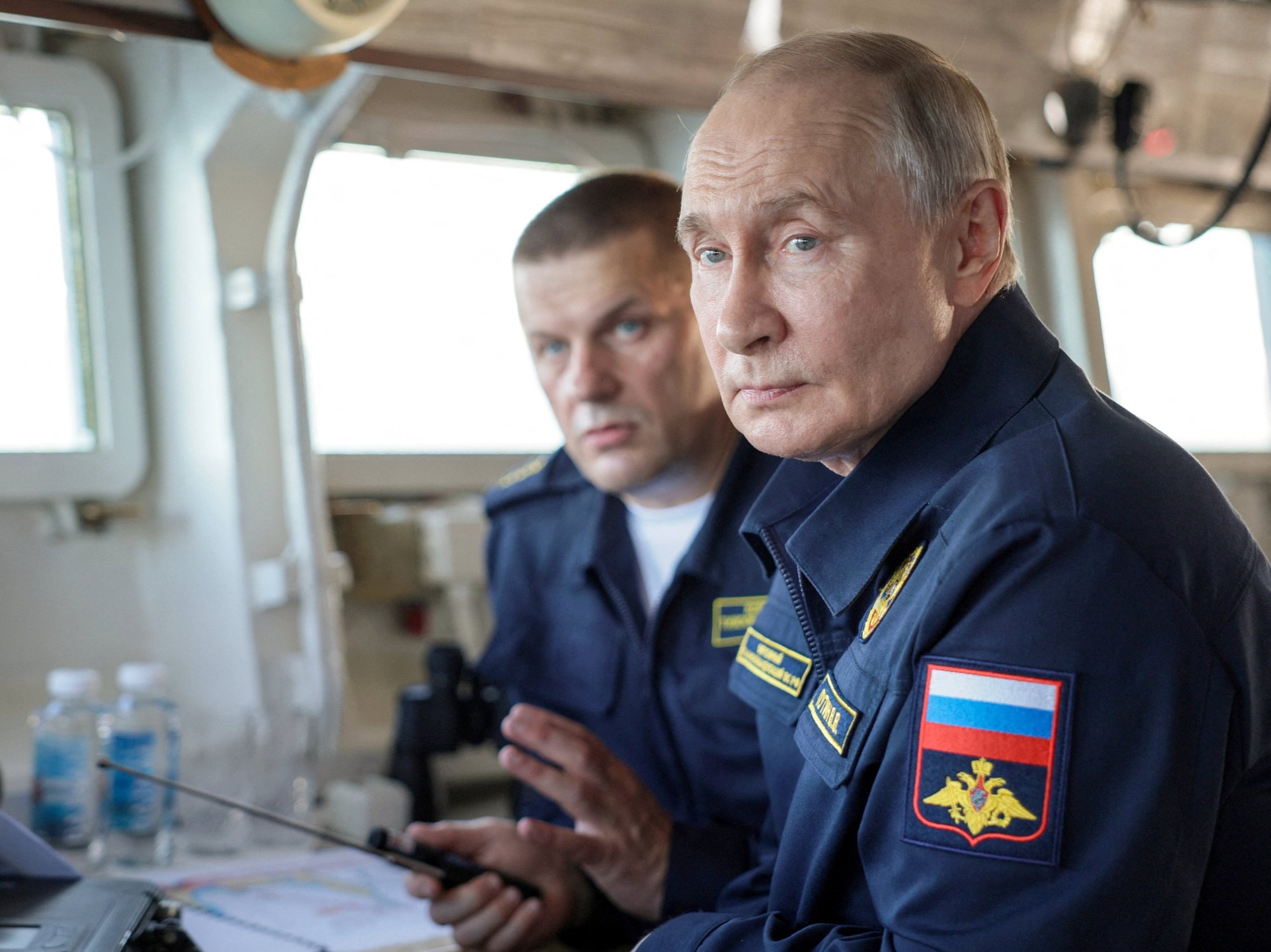 Vladimir Putin observes a military drill of Pacific fleet in Sakhalin region