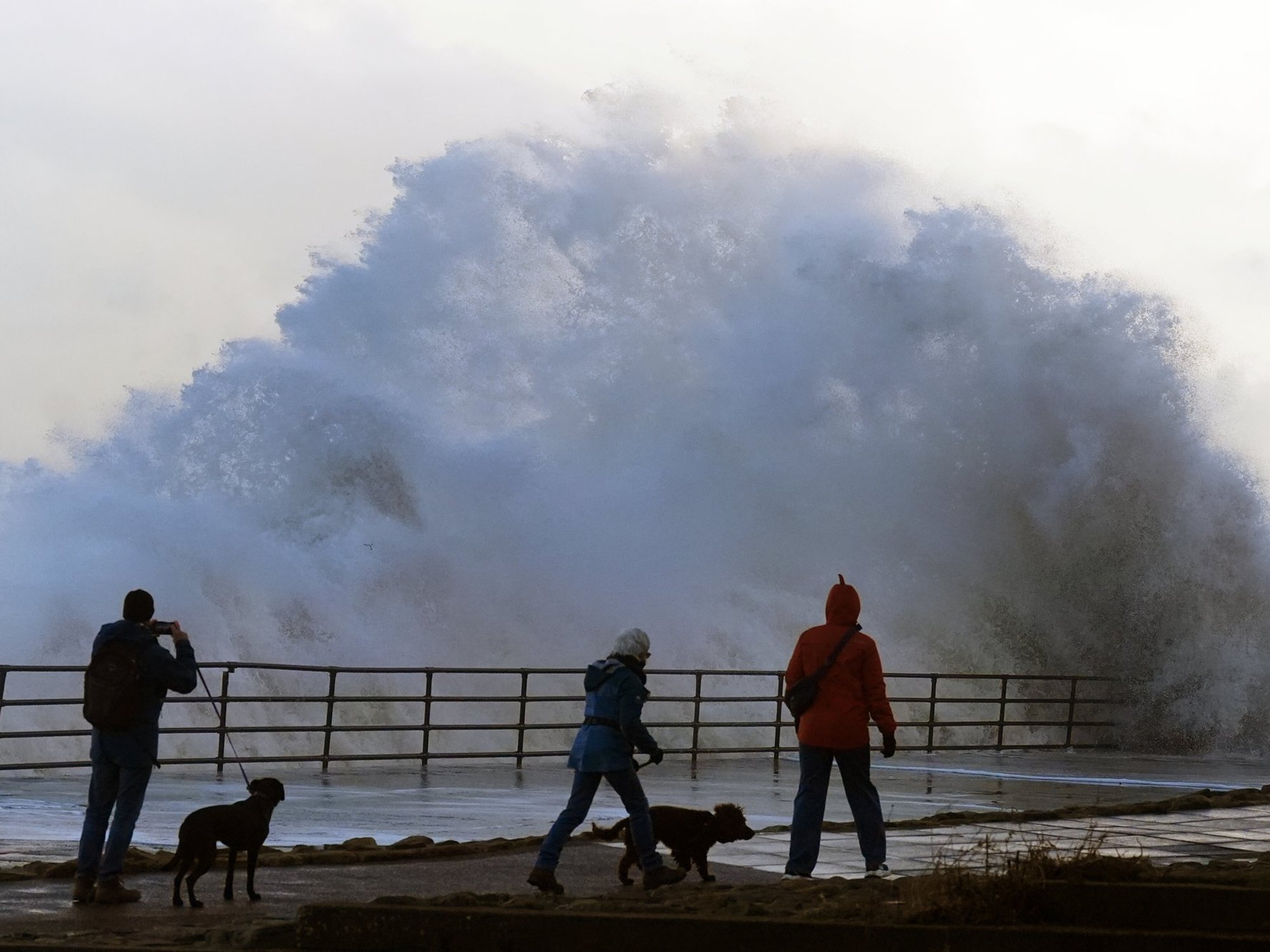 Waves crash against the sea wall in Whitley Bay, North Tyneside.