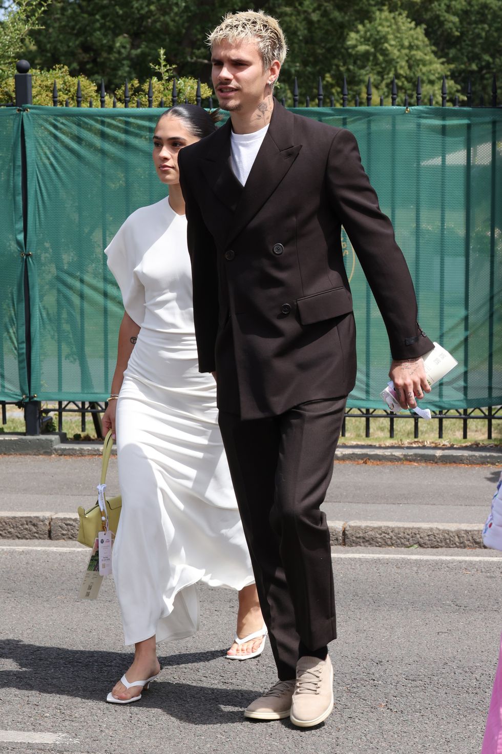 Wimbledon Day One: Romeo Beckham and Kim Turnbull