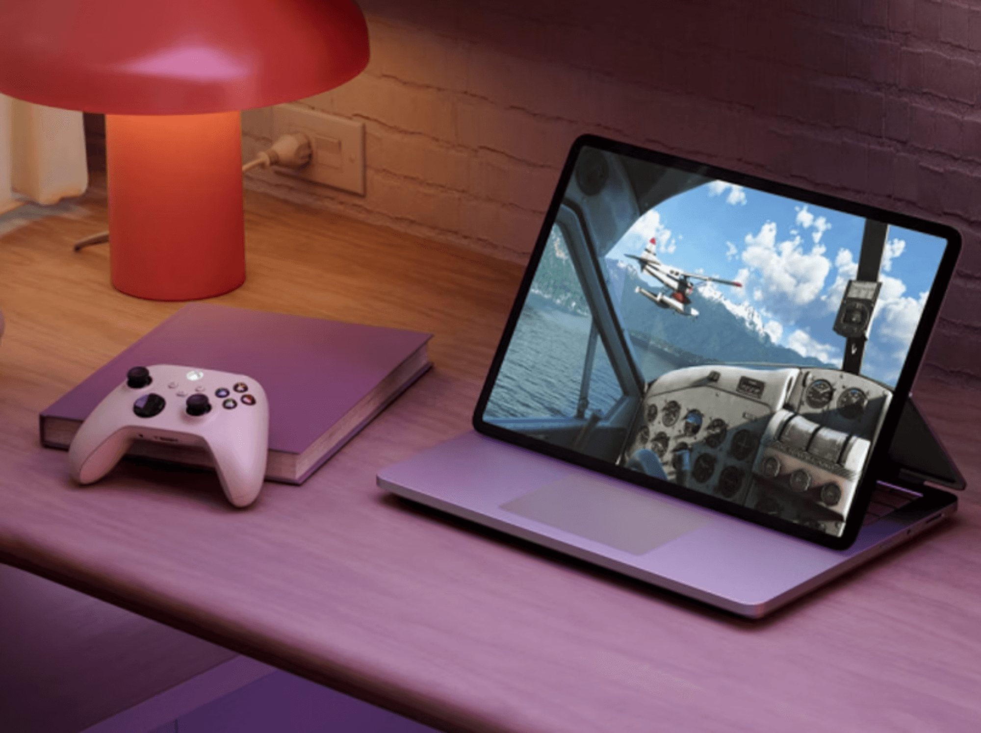 Windows 11 PC next to game controller