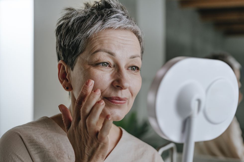 woman applying skin care