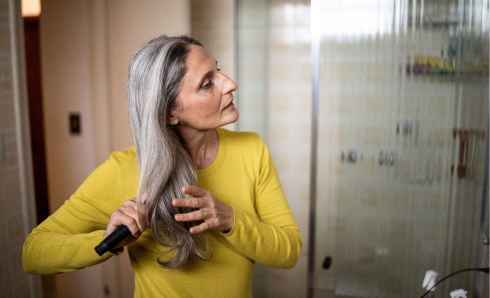Woman brushing her hair