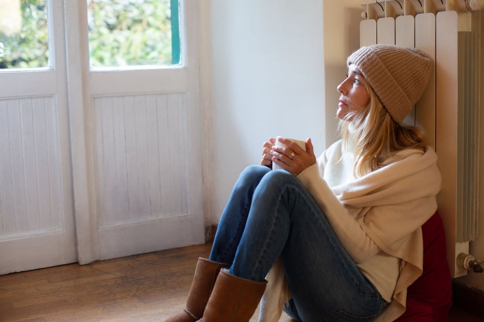 Woman cold in house