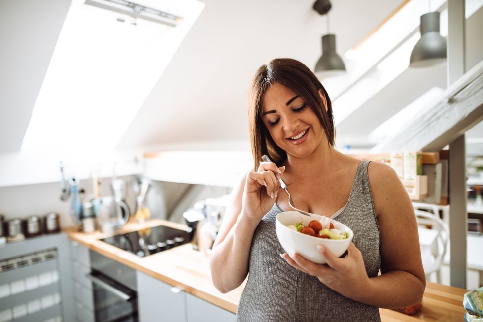 Woman eating fruit