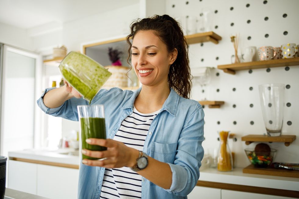 Woman making a smoothie