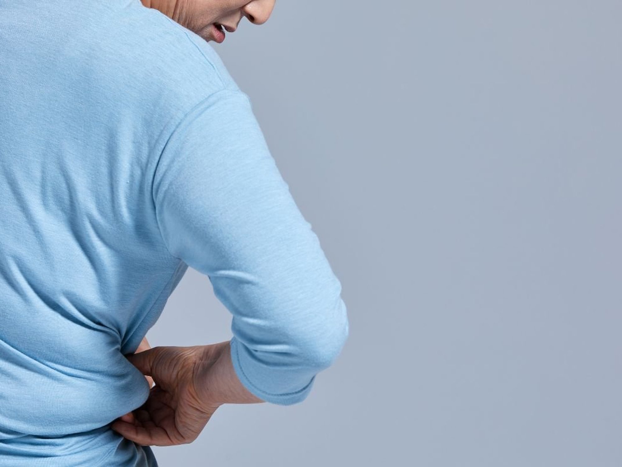 woman pinching body fat