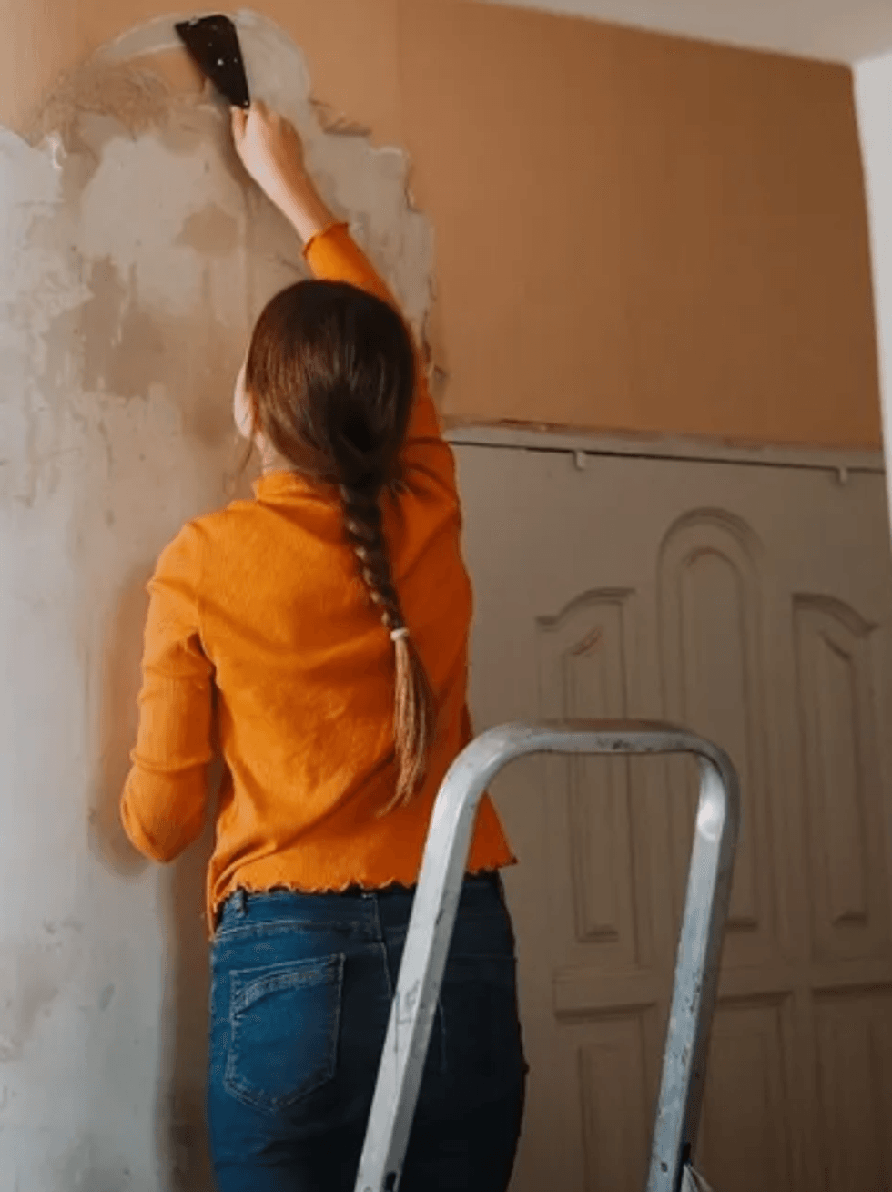 Woman plaster wall