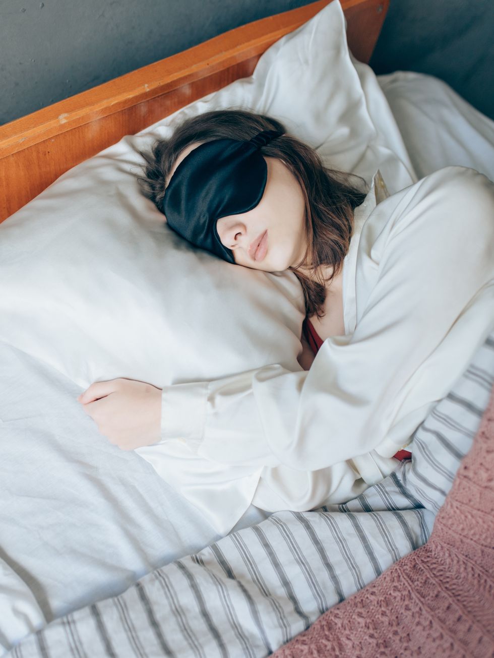 Woman sleeping with silk pillowcase