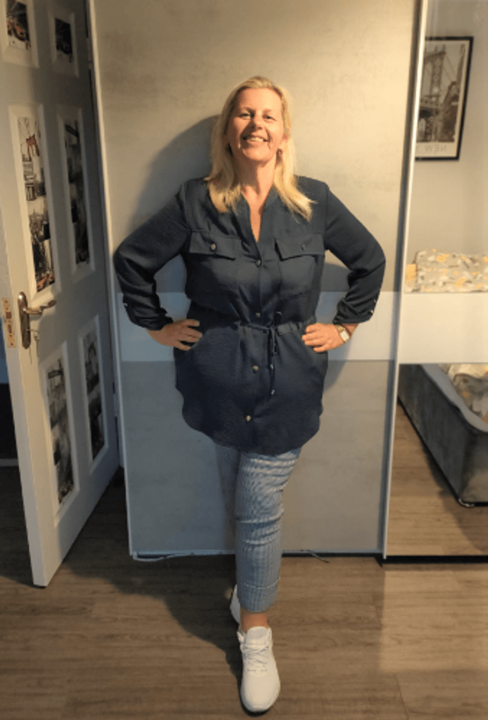 Woman standing after losing weight