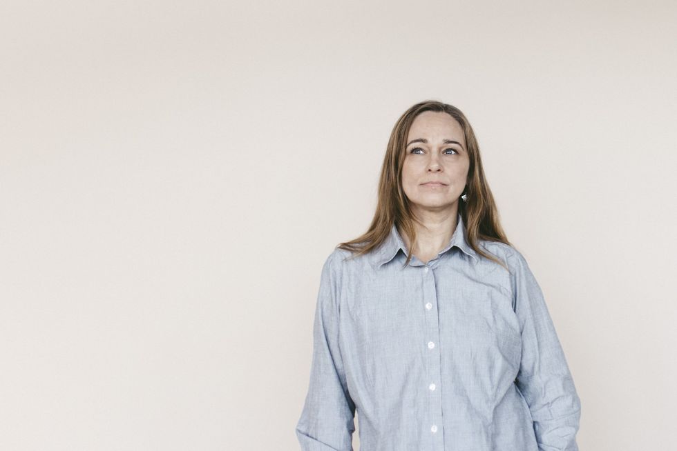 Woman wearing a button-down shirt