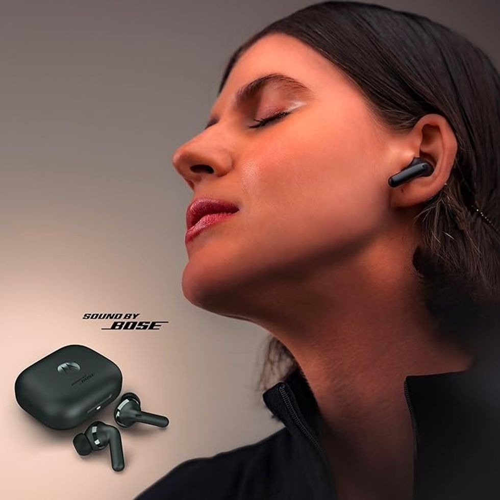 Woman wearing Moto Buds+