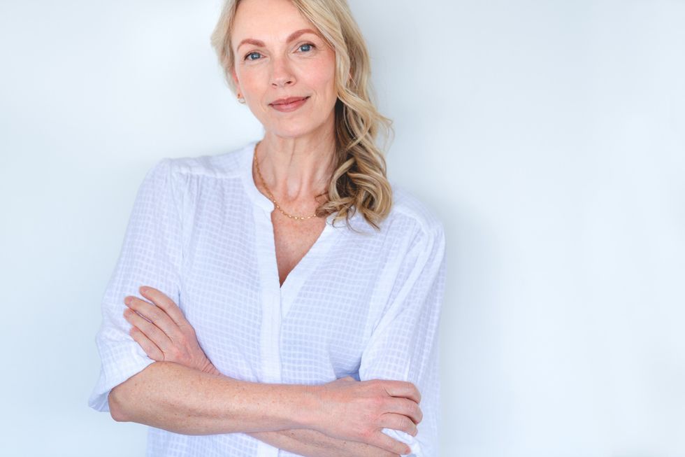 Woman wearing three-quarter sleeved blouse
