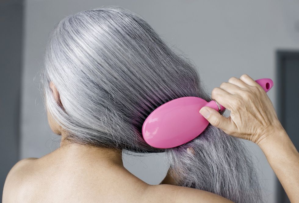 Woman with long grey hair