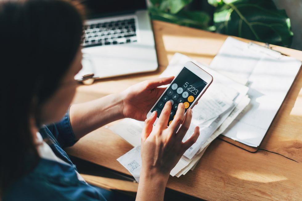Woman working out her finances