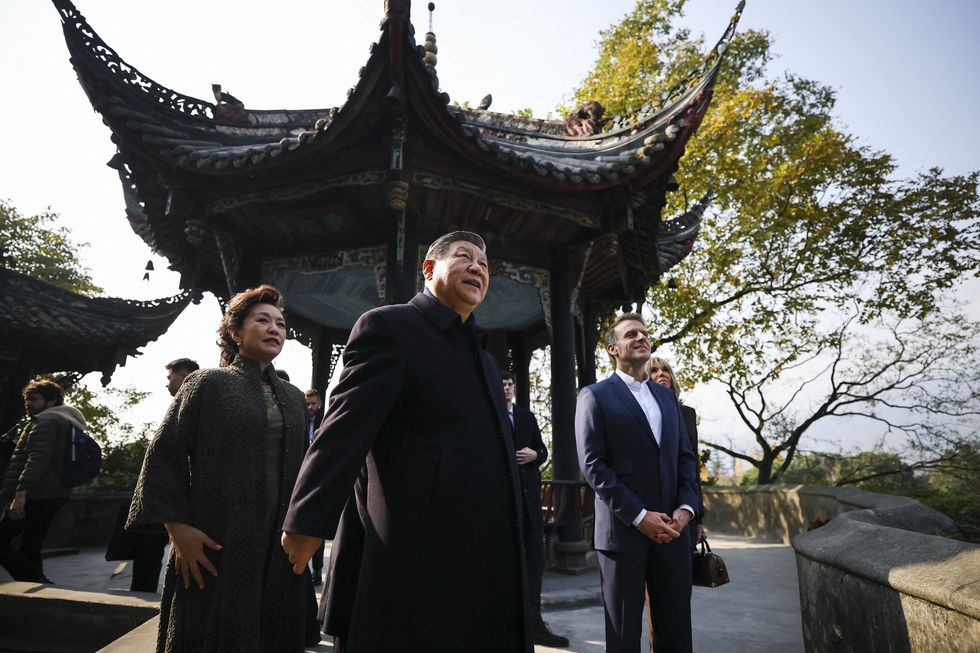 Xi Jinping and Emmanuel Macron in China