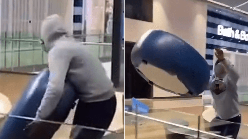 Youth throwing chair in Westfield, Stratford