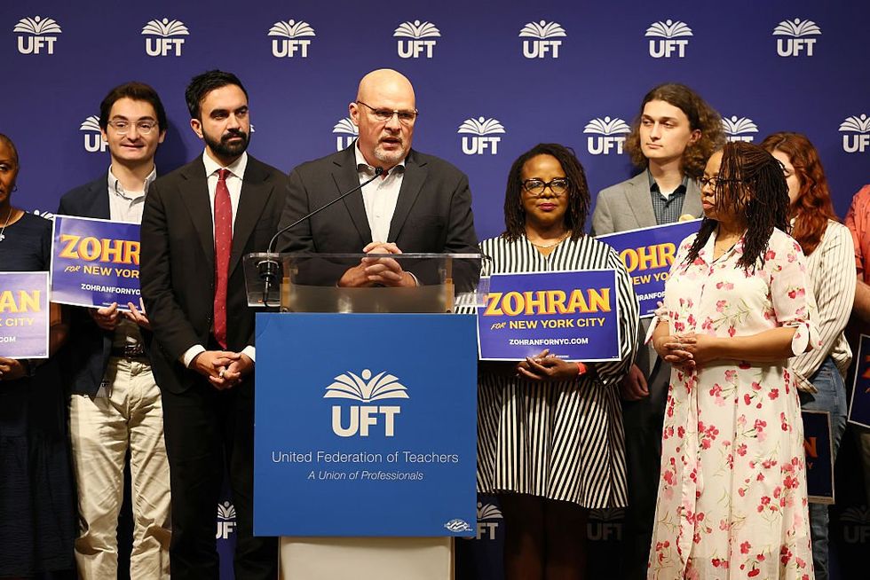 Zohran Mamdani (centre left) being endorsed by UFT President Michael Mulgrew (centre) in 2025